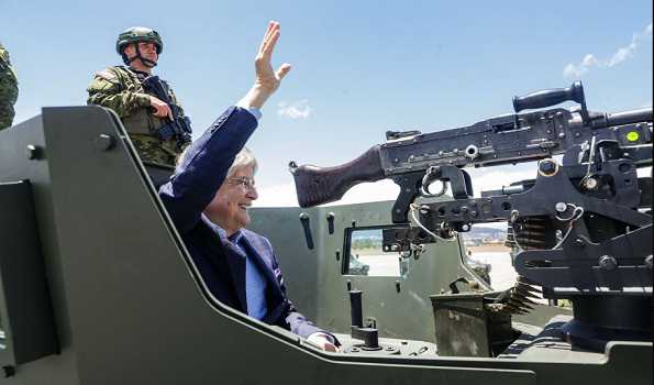 Ecuador's president delivers armored vehicles to army to combat organized crime