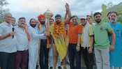 KATRA, JUNE 6 (UNI):-Delhi Wrestler Sumit with officials after winning main bout of Aghar Jitto Kesari Dangal competition organised in Katra town of Reasi district of Jammu and Kashmir on Tuesday. UNI PHOTO-96U
