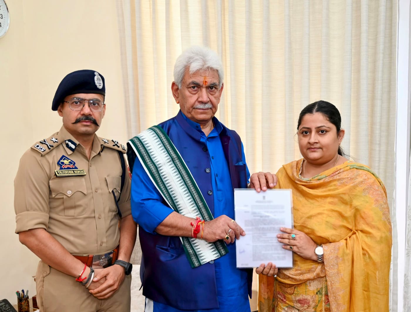 J&K LG hands over appointment letter to deceased PSI's wife