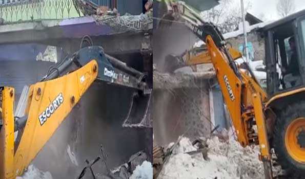 Now commercial structure belonging to an ex-min demolished in Shopian