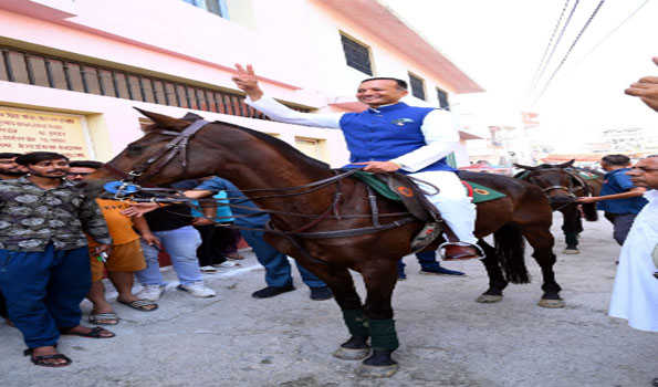 BJP MP reaches his polling station on horse
