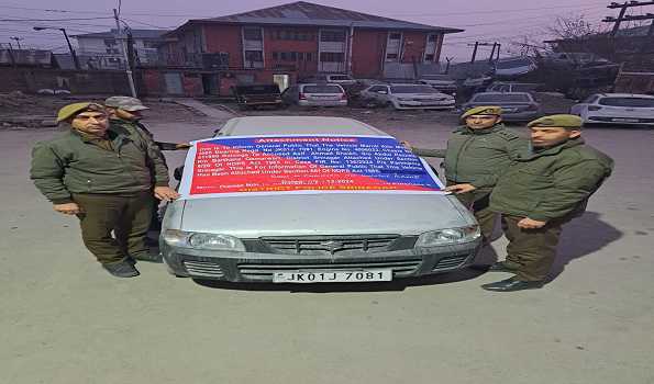 J&K: Police seize vehicle acquired from narcotics trade in Srinagar