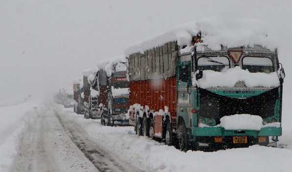 Flights grounded, highway shut as snowfall cripples life in Kashmir
