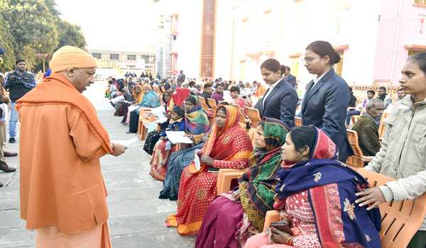 Yogi warns officials against negligence in resolving people's issues