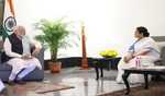 Mamata  calls on  Prime Minister  at Raj Bhavan