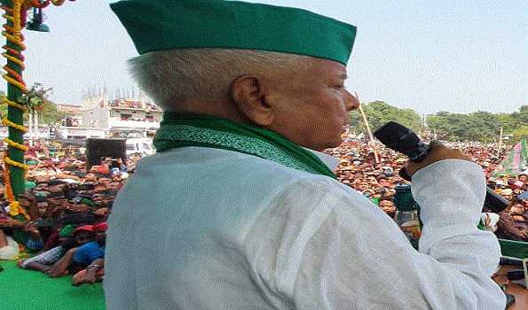 Modi hellbent on dividing society, has no moral right to continue as PM : Lalu