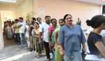 Karnataka logs 38 23 pc voter turnout by 1 pm