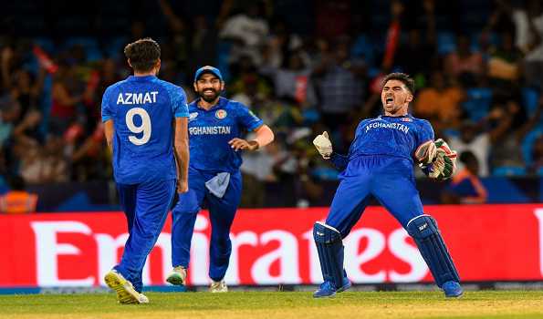Gulbadin keeps semifinal hopes alive as Afghanistan defeat Australia