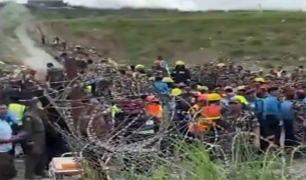 Plane with 23 aboard crashes at airport in Kathmandu
