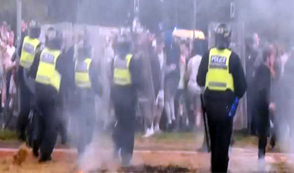 UK protesters attempt to set another hotel with migrants on fire