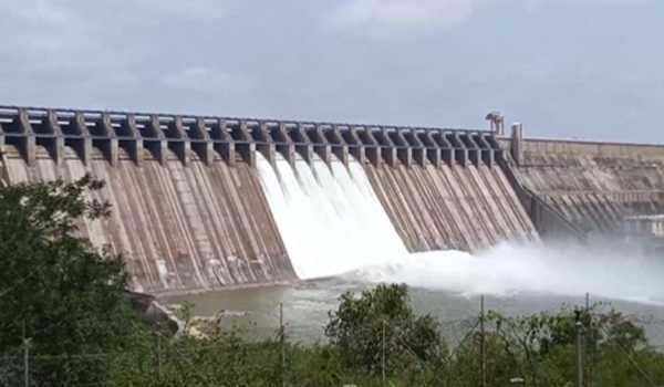 Heavy inflow to N S Project, crest gates lifted to release water