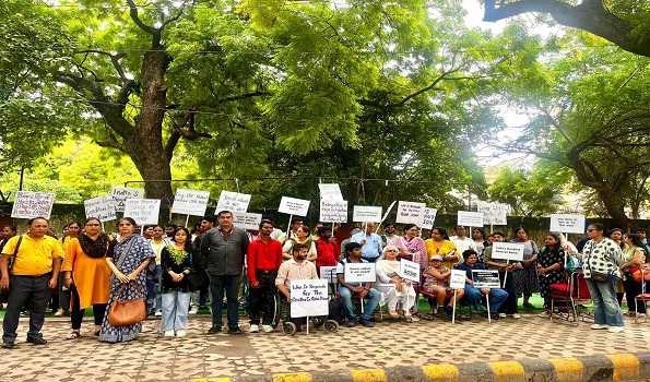 DRG stages protest over  death of 14 individuals in Delhi