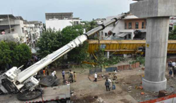 Crane falls on house near metro project site in Surat