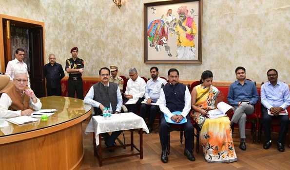 Telangana Guv distributes essentials to outsourcing employees & sanitary workers