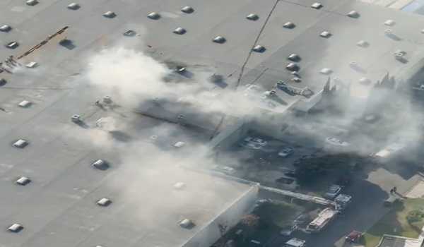 Two people dead after small plane crashes into California building