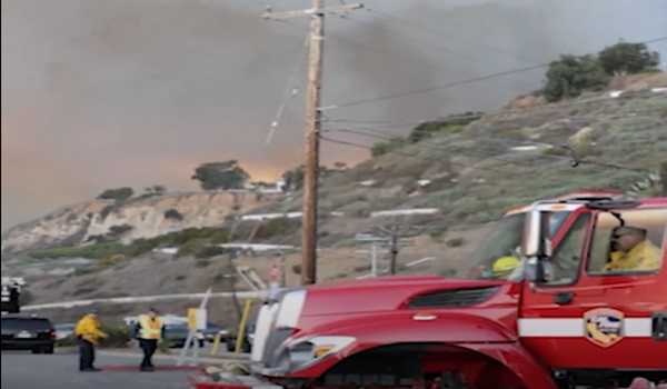 Dangerous winds forecast in L.A. complicate wildfire-containing efforts