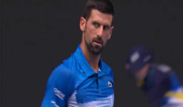 Djokovic battles through to Australian Open third round