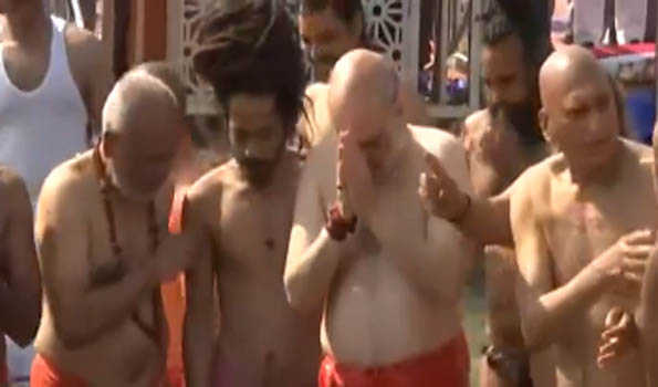 Overwhelmed by bathing in  presence of saints in 