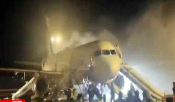 SKorean fire authorities say airplane on fire at airport in Busan