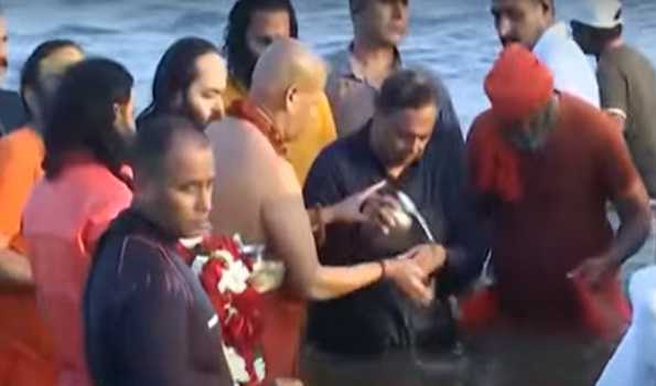 RIL Chairman Mukesh Ambani, family take holy dip in Sangam