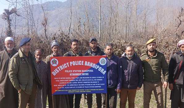 J&K Police attach 18 kanals of land under UAPA Act in Bandipora