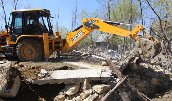 Police demolish Illicit structure linked to Pak-based LeT handler