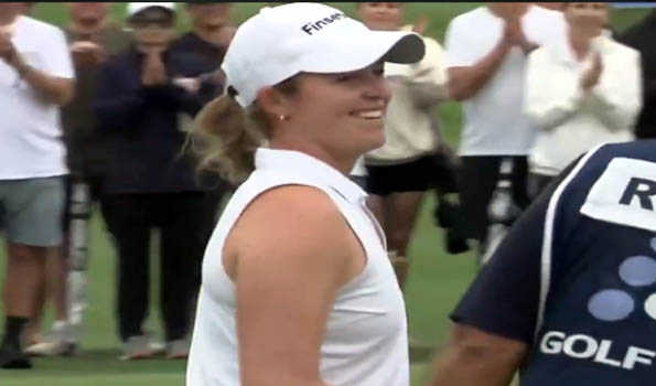 Mimi Rhodes of England holds nerve to claim maiden LET victory