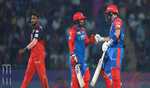 RCB restrict Delhi Capitals to modest total