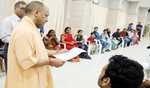 Satisfaction on every face is priority of govt: Yogi
