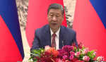Xi
