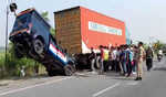 UP: Five, including four policemen, die after official vehicle collides with container