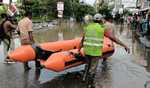 Roads flooded as BBMP deploys boats for rescue