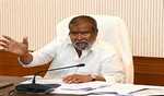Telangana Health Minister reviews COVID-19 situation, urges vigilance against seasonal diseases