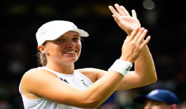 Swiatek eases into QFs after beating Clara Tauson