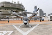 Shenzhen, Feb. 28, 2024 (Xinhua) -- A 5-seat eVTOL (electric vertical takeoff and landing) aircraft is seen at Shekou Cruise Home Port in Shenzhen, south China's Guangdong Province, Feb. 27, 2024. The eVTOL aircraft, developed by a high-tech company AutoFlight and named as Prosperity, completed its inter-city electric air-taxi demonstration flight from Shekou Cruise Home Port in Shenzhen to Jiuzhou Port in Zhuhai. With a maximum range of 250 kilometers, the electric-powered Prosperity is capable of carrying 5 people with a cruise speed of up to 200 kilometers per hour. UNI PHOTO-8F