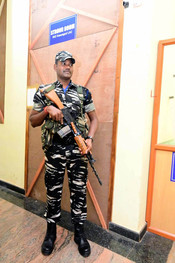 KASARAGOD, APR 27 (UNI):- Central force police personnel providing security to strong room, where the EVMs and VVPATs used in the second phase Lok Sabha polls at seven Assembly constituencies came under the Kasaragod Parliamentary Constituency, kept at Periya Kerala Central University campus, on Saturday. UNI PHOTO-81U